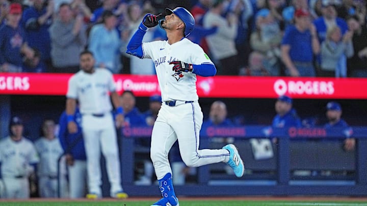 Mar 27, 2025; Toronto, Ontario, CAN; Toronto Blue Jays left fielder Andres Gimenez (0) celebrates after hitting a two run home run against the Baltimore Orioles during the fourth inning at Rogers Centre. Mandatory Credit: Nick Turchiaro-Imagn Images