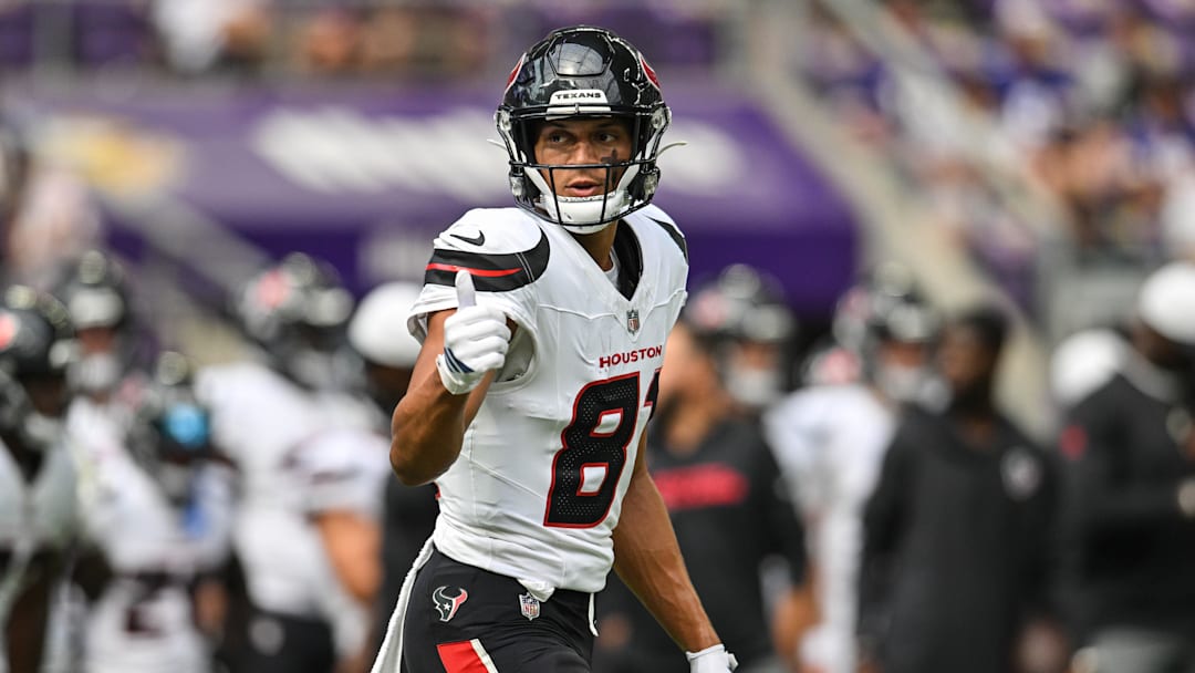 Aug 9, 2025; Minneapolis, Minnesota, USA; Houston Texans wide receiver Jayden Higgins (81) warms up before the game against the Minnesota Vikings at U.S. Bank Stadium. Mandatory Credit: Jeffrey Becker-Imagn Images