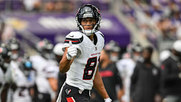 Aug 9, 2025; Minneapolis, Minnesota, USA; Houston Texans wide receiver Jayden Higgins (81) warms up before the game against the Minnesota Vikings at U.S. Bank Stadium. Mandatory Credit: Jeffrey Becker-Imagn Images