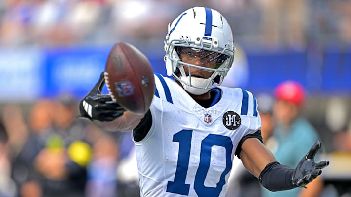 Sep 28, 2025; Inglewood, California, USA; Indianapolis Colts wide receiver Adonai Mitchell (10) drops the ball crossing the goal line causing a touchback in the second half against the Los Angeles Rams at SoFi Stadium. Sep 28, 2025; Inglewood, California, USA; Indianapolis Colts wide receiver Adonai Mitchell (10) drops the ball crossing the goal line causing a touchback in the second half against the Los Angeles Rams at SoFi Stadium.