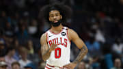 Apr 6, 2025; Charlotte, North Carolina, USA; Chicago Bulls guard Coby White (0) stands on the court during the first quarter against the Charlotte Hornets at Spectrum Center. Mandatory Credit: Nell Redmond-Imagn Images