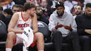 Oct 6, 2025; Houston, Texas, USA; Houston Rockets forward Kevin Durant (right) talks with center Alperen Sengun (28) on the bench during the second quarter against the Atlanta Hawks at Toyota Center. Mandatory Credit: Troy Taormina-Imagn Images