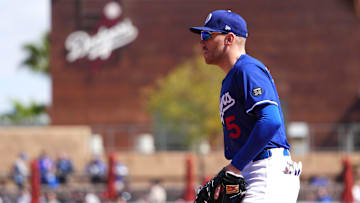 Mar 6, 2025; Phoenix, Arizona, USA; Los Angeles Dodgers first base Freddie Freeman (5) looks on against the Texas Rangers during the second inning at Camelback Ranch-Glendale. Mandatory Credit: Joe Camporeale-Imagn Images