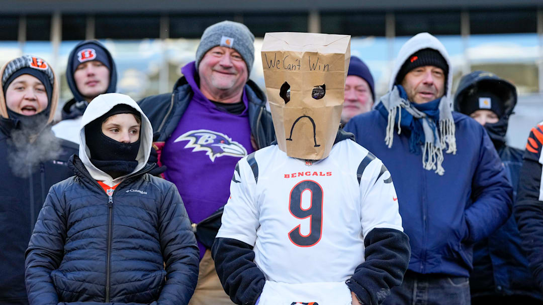 Cold Bengals fans look on in the fourth quarter of the NFL Week 15 game between the Cincinnati Bengals and the Baltimore Ravens at Paycor Stadium in Cincinnati on Sunday, Dec. 14, 2025. The Bengals were shut out, 24-0.