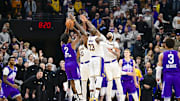 Dec 1, 2024; Salt Lake City, Utah, USA; Utah Jazz guard Collin Sexton (2) gets blocked by Los Angeles Lakers forward LeBron James (23), forward/center Anthony Davis (3), and center Christian Koloko (10) in the final second of the second half at the Delta Center. Mandatory Credit: Christopher Creveling-Imagn Images