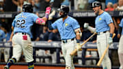 Sep 22, 2024; St. Petersburg, Florida, USA; Tampa Bay Rays first baseman  Jonathan Aranda (62) celebrates with his teammates after hitting a two run home run in the sixth inning against the Toronto Blue Jays at Tropicana Field. Mandatory Credit: Jonathan Dyer-Imagn Images