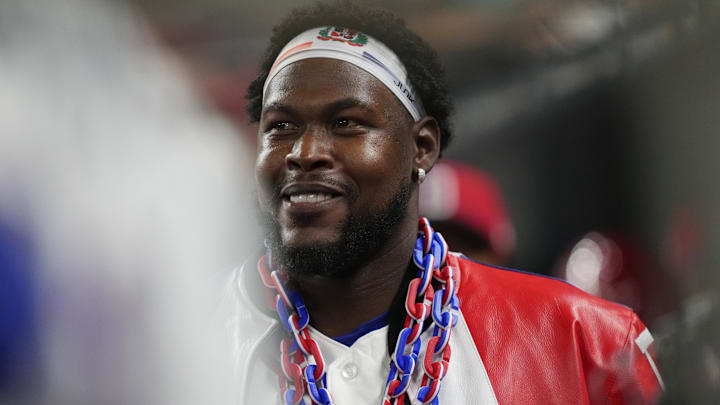 Mar 6, 2026; Miami, FL, United States;  Dominican Republic center fielder Oneil Cruz (15) celebrates his three-run home run in the eighth inning against Nicaragua with teammates at loanDepot Park. Mandatory Credit: Jim Rassol-Imagn Images