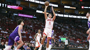 Oct 8, 2025; Houston, Texas, USA; Houston Rockets guard Reed Sheppard (15) shoots the ball during the third quarter against the Utah Jazz at Toyota Center. Mandatory Credit: Troy Taormina-Imagn Images