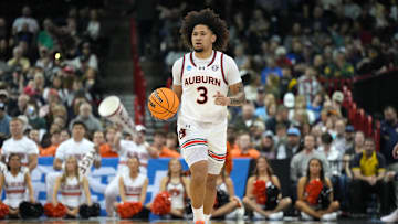 Mar 22, 2024; Spokane, WA, USA; Auburn Tigers guard Tre Donaldson (3) dribbles the ball up the court