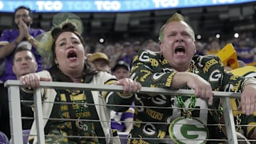 Dec 29, 2024; Minneapolis, Minnesota, USA; Green Bay Packers fans urge on their defense during the fourth quarter against the Minnesota Vikings at U.S. Bank Stadium. Mandatory Credit: Mark Hoffman/USA TODAY NETWORK-Wisconsin via Imagn Images