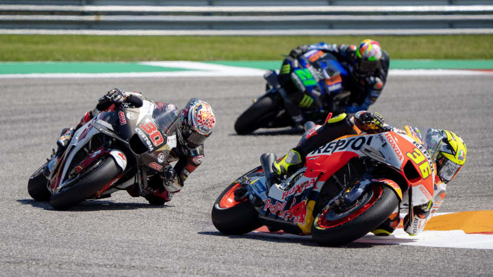 Apr 15, 2023; Austin, TX, USA; Joan Mir (36) of Spain and Repsol Honda Team, Takaaki Nakagami (30) of Japan and LCR Honda Idemitsu and Franco Morbidelli (21) of Italy and Mondster Energy Yamaha MotoGP Team take turn 11 during the MotoGP Sprint Race at Circuit of the Americas. Mandatory Credit: Dustin Safranek-USA TODAY Sports