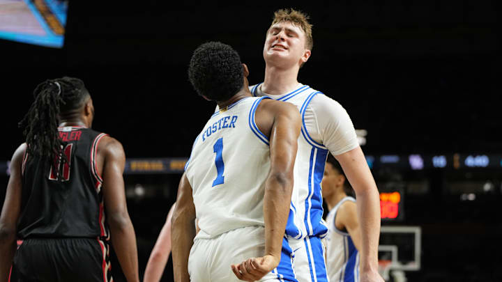 Apr 5, 2025; San Antonio, TX, USA; Duke Blue Devils forward Cooper Flagg (2) celebrates with guard Caleb Foster (1) after a play against the Houston Cougars during the first half in the semifinals of the men's Final Four of the 2025 NCAA Tournament at the Alamodome. Mandatory Credit: Bob Donnan-Imagn Images Apr 5, 2025; San Antonio, TX, USA; Duke Blue Devils forward Cooper Flagg (2) celebrates with guard Caleb Foster (1) after a play against the Houston Cougars during the first half in the semifinals of the men's Final Four of the 2025 NCAA Tournament at the Alamodome. Mandatory Credit: Bob Donnan-Imagn Images