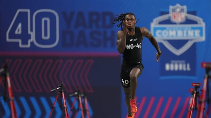 Mar 2, 2024; Indianapolis, IN, USA; Texas wide receiver Xavier Worthy (WO40) ran an official time of 4.21 seconds to set a combine record during the 2024 NFL Combine at Lucas Oil Stadium. Mandatory Credit: Kirby Lee-USA TODAY Sports