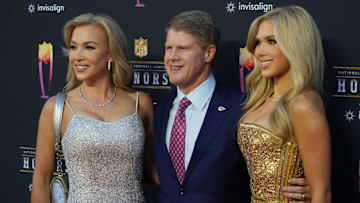 Kansas City Chiefs owner Clark Hunt with his wife Tavia Hunt and daughter Gracie Hunt on the red carpet at the NFL Honors awards.