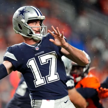 Aug 13, 2022; Denver, Colorado, USA; Dallas Cowboys quarterback Ben DiNucci (17) prepares to pass the ball in the second half against the Denver Broncos at Empower Field at Mile High. Mandatory Credit: Ron Chenoy-USA TODAY Sports