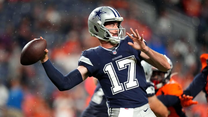 Aug 13, 2022; Denver, Colorado, USA; Dallas Cowboys quarterback Ben DiNucci (17) prepares to pass the ball in the second half against the Denver Broncos at Empower Field at Mile High. Mandatory Credit: Ron Chenoy-USA TODAY Sports