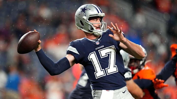 Aug 13, 2022; Denver, Colorado, USA; Dallas Cowboys quarterback Ben DiNucci (17) prepares to pass the ball in the second half against the Denver Broncos at Empower Field at Mile High.