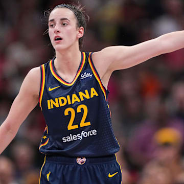 Indiana Fever guard Caitlin Clark (22) points to the other side of the court Wednesday, Sept. 4, 2024, during the game at Gainbridge Fieldhouse in Indianapolis.