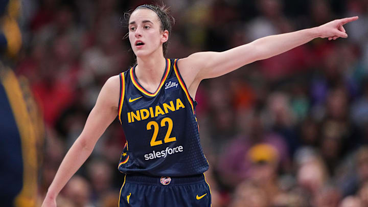 Indiana Fever guard Caitlin Clark (22) points to the other side of the court Wednesday, Sept. 4, 2024, during the game at Gainbridge Fieldhouse in Indianapolis.