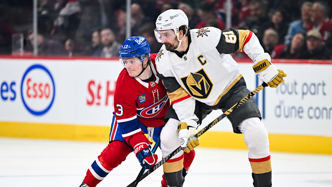 Cole Caufield and Mark Stone jostle for position