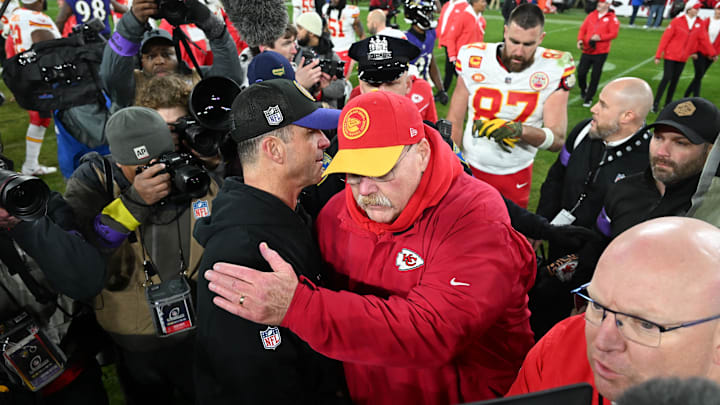 Jan 28, 2024; Baltimore, Maryland, USA; Baltimore Ravens head coach John Harbaugh (left) shakes hands with Kansas City Chiefs head coach Andy Reid (right) after the AFC Championship football game at M&T Bank Stadium. Mandatory Credit: Tommy Gilligan-Imagn Images