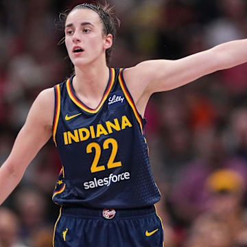 Indiana Fever guard Caitlin Clark (22) points to the other side of the court Wednesday, Sept. 4, 2024, during the game at Gainbridge Fieldhouse in Indianapolis.