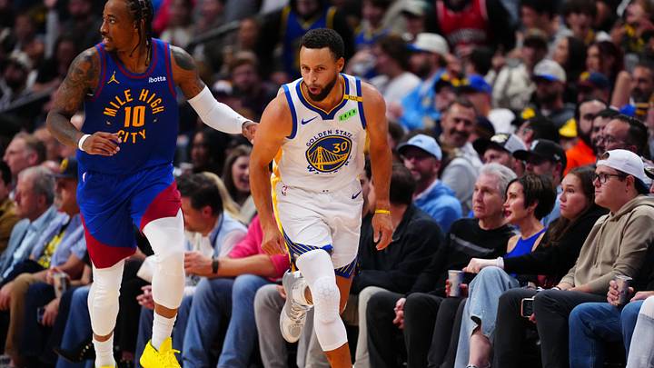 Oct 26, 2026; Denver, Colorado, USA;  Golden State Warriors guard Stephen Curry (30) reacts following his three point basket in the second half against the Denver Nuggets at Ball Arena.  Mandatory Credit: Ron Chenoy-Imagn Images