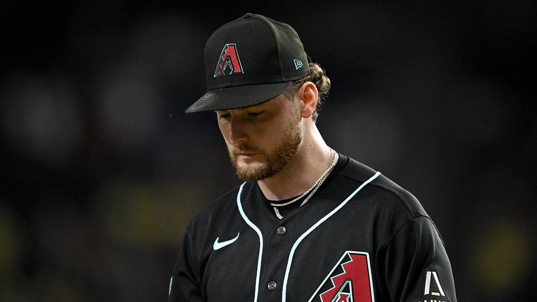 May 13, 2026; Arlington, Texas, USA;  Arizona Diamondbacks starting pitcher Ryne Nelson (19) comes off the field after he gives up a three run home run to the Texas Rangers during the fifth inning at Globe Life Field. Mandatory Credit: Jerome Miron-Imagn Images