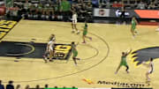Caitlin Clark shoots a three-pointer from near half-court against Brazil. 