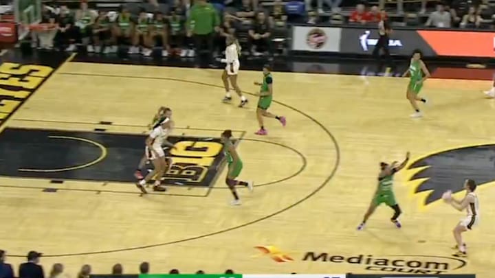Caitlin Clark shoots a three-pointer from near half-court against Brazil. Caitlin Clark shoots a three-pointer from near half-court against Brazil.