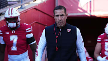 Oct 11, 2025; Madison, Wisconsin, USA; Wisconsin Badgers head coach Luke Fickell leads his team out of the tunnel at Camp Randall Stadium. Mandatory Credit: Ross Harried-Imagn Images