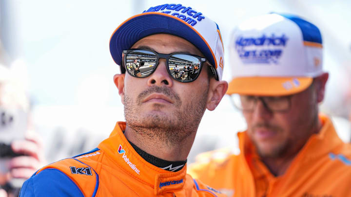 Arrow McLaren/Rick Hendrick driver Kyle Larson (17) sits on the pit wall Friday, May 24, 2024, during Carb Day ahead of the 108th running of the Indianapolis 500 at Indianapolis Motor Speedway.