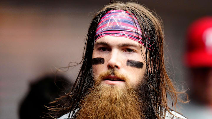 Philadelphia Phillies center fielder Brandon Marsh (16) walks through in the dugout in the second inning of the MLB National League game between the Cincinnati Reds and the Philadelphia Phillies at Great American Ball Park in downtown Cincinnati on Tuesday, Aug. 16, 2022.

Philadelphia Phillies At Cincinnati Reds