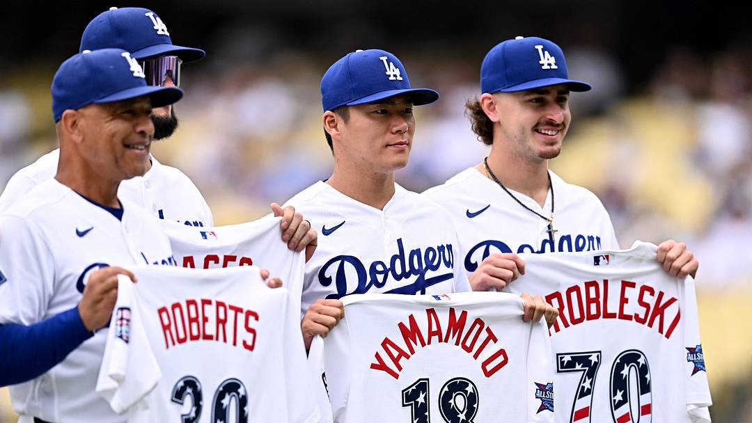 Jul 12, 2026; Los Angeles, California, USA; Los Angeles Dodgers manager Dave Roberts (30), pitcher Yoshinobu Yamamoto (18), and pitcher Justin Wrobleski (70) pose with their All-Star game jerseys before the game against the Arizona Diamondbacks at Dodger Stadium. Mandatory Credit: William Liang-Imagn Images