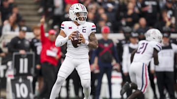 Nov 15, 2025; Cincinnati, Ohio, USA;  Arizona Wildcats quarterback Noah Fifita (1) drops back to pass against the Cincinnati Bearcats in the first half at Nippert Stadium. Mandatory Credit: Aaron Doster-Imagn Images