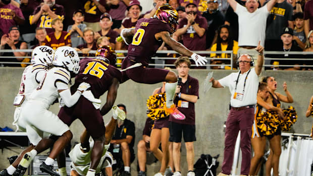 Arizona State Sun Devils wide receiver Jordyn Tyson (0) hurdles in the second quarter of the game 