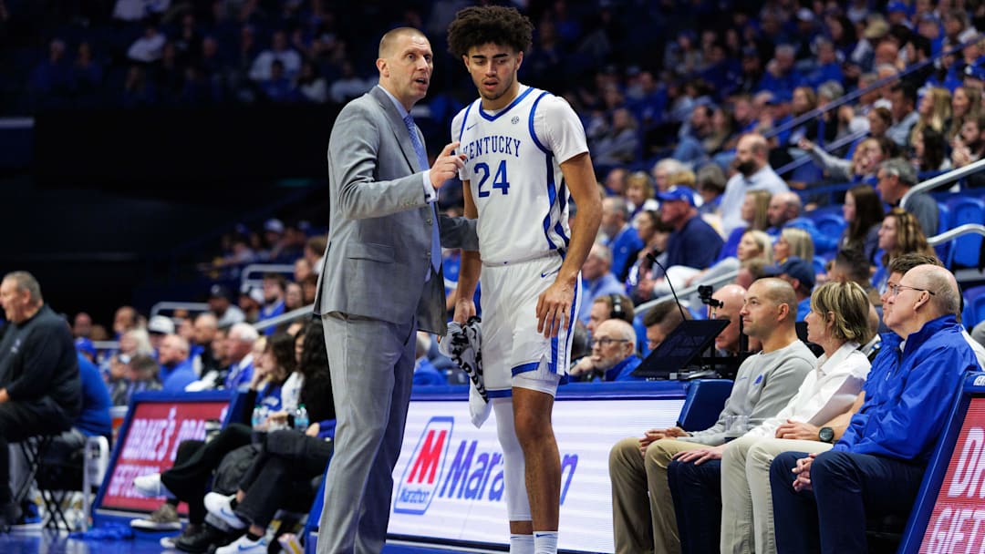 Nov 14, 2025; Lexington, Kentucky, USA; Kentucky Wildcats head coach Mark Pope talks to center Malachi Moreno (24) during the second half against the Eastern Illinois Panthers at Rupp Arena at Central Bank Center. Mandatory Credit: Jordan Prather-Imagn Images
