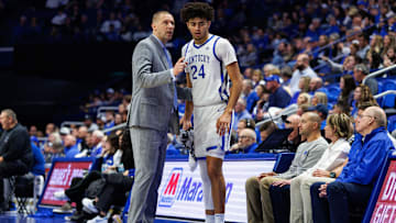 Nov 14, 2025; Lexington, Kentucky, USA; Kentucky Wildcats head coach Mark Pope talks to center Malachi Moreno (24) during the second half against the Eastern Illinois Panthers at Rupp Arena at Central Bank Center. Mandatory Credit: Jordan Prather-Imagn Images