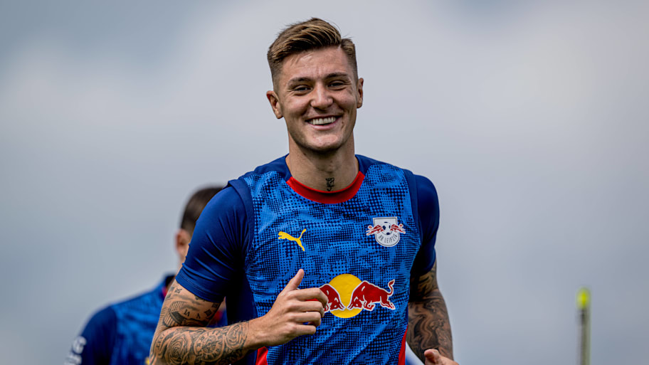 Benjamin Šeško grinning.