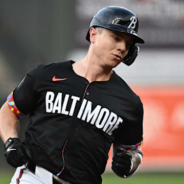 Jul 25, 2025; Baltimore, Maryland, USA;  Baltimore Orioles outfielder Tyler O'Neill (9) rounds the bases after hitting a solo home run during the first inning against the Colorado Rockies at Oriole Park at Camden Yards. Mandatory Credit: James A. Pittman-Imagn Images