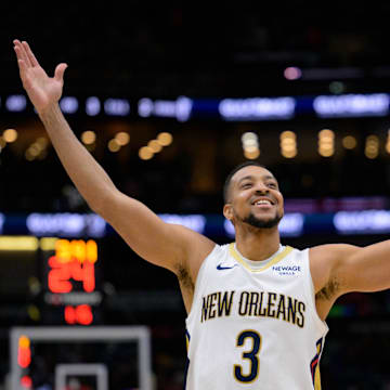 Mar 11, 2025; New Orleans, Louisiana, USA; New Orleans Pelicans guard CJ McCollum (3) reacts after a three-point basket against the Los Angeles Clippers during the fourth quarter at Smoothie King Center. Mandatory Credit: Matthew Hinton-Imagn Images