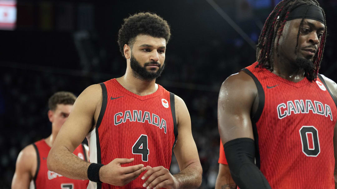 Aug 6, 2024; Paris, France; Canada guard Jamal Murray (4) leaves the court after the loss against France in a men’s basketball quarterfinal game during the Paris 2024 Olympic Summer Games at Accor Arena. Mandatory Credit: Kyle Terada-USA TODAY Sports