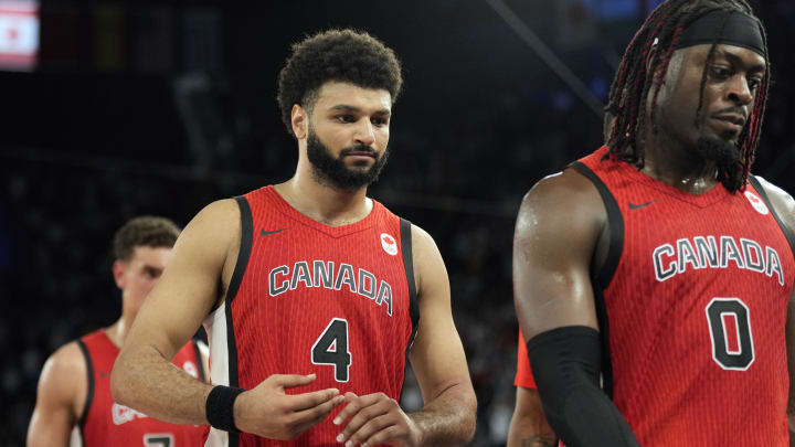 Aug 6, 2024; Paris, France; Canada guard Jamal Murray (4) leaves the court after the loss against France in a men’s basketball quarterfinal game during the Paris 2024 Olympic Summer Games at Accor Arena. Mandatory Credit: Kyle Terada-USA TODAY Sports