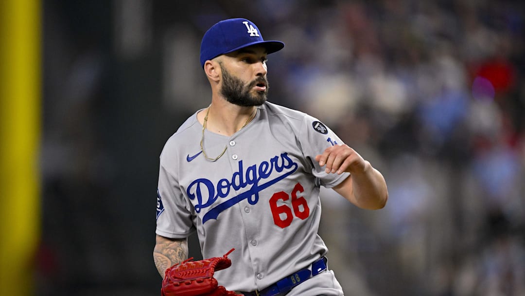Apr 20, 2025; Arlington, Texas, USA; Los Angeles Dodgers relief pitcher Tanner Scott (66) pitches during the game between the Texas Rangers and the Los Angeles Dodgers at Globe Life Field. Mandatory Credit: Jerome Miron-Imagn Images Apr 20, 2025; Arlington, Texas, USA; Los Angeles Dodgers relief pitcher Tanner Scott (66) pitches during the game between the Texas Rangers and the Los Angeles Dodgers at Globe Life Field. Mandatory Credit: Jerome Miron-Imagn Images