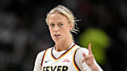 Aug 1, 2025; Dallas, Texas, USA;  Indiana Fever guard Sophie Cunningham (8) points to her teammates during the first half against the Dallas Wings at the American Airlines Center. Mandatory Credit: Jerome Miron-Imagn Images