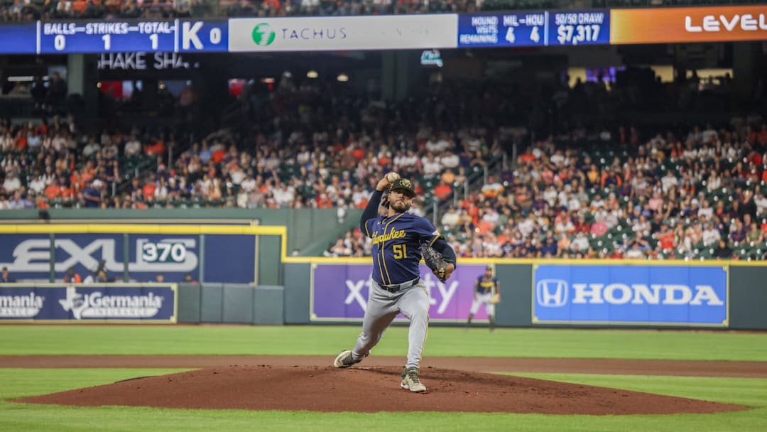 May 17, 2024; Houston, Texas, USA; Milwaukee Brewers starting pitcher Freddy Peralta (51) pitches against the Houston Astros in the inning at Minute Maid Park.