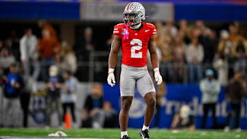 Jan 10, 2025; Arlington, TX, USA; Ohio State Buckeyes safety Caleb Downs (2) in action during the game between the Texas Longhorns and the Ohio State Buckeyes at AT&T Stadium. Mandatory Credit: Jerome Miron-Imagn Images