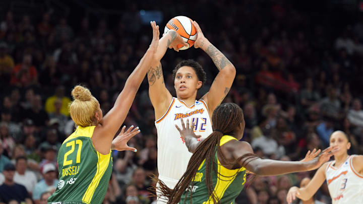 Aug 5, 2023; Phoenix, Arizona, USA; Phoenix Mercury center Brittney Griner (42) shoots over Seattle Storm center Mercedes Russell (21) during the first half at Footprint Center. Mandatory Credit: Joe Camporeale-Imagn Images