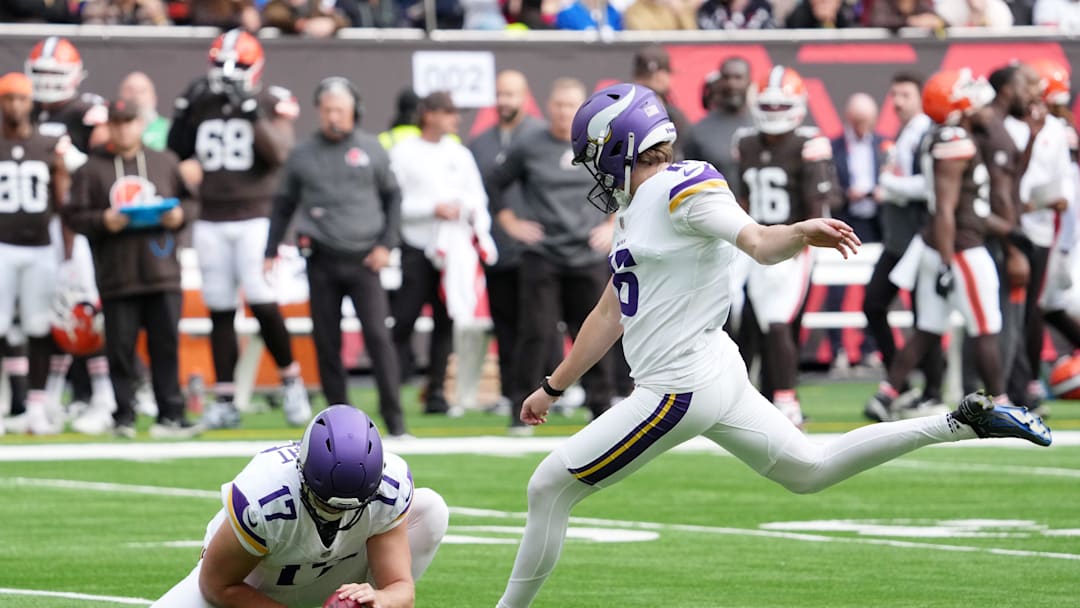 Oct 5, 2025; Tottenham, United Kingdom; Minnesota Vikings kicker Will Reichard (16) kicks a point after attempt against the Cleveland Browns during the first quarter of an NFL International Series game at Tottenham Hotspur Stadium. Mandatory Credit: Kirby Lee-Imagn Images