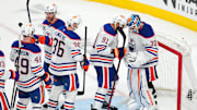 May 6, 2025; Las Vegas, Nevada, USA; Edmonton Oilers players celebrate after defeating the Vegas Golden Knights 4-2 in game one of the second round of the 2025 Stanley Cup Playoffs at T-Mobile Arena. Mandatory Credit: Stephen R. Sylvanie-Imagn Images